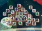 Peli Among Mahjong Tiles verkossa